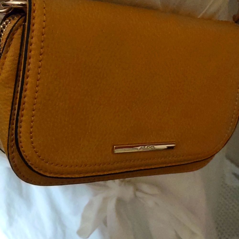 Also crossbody &waste pouch mustard color